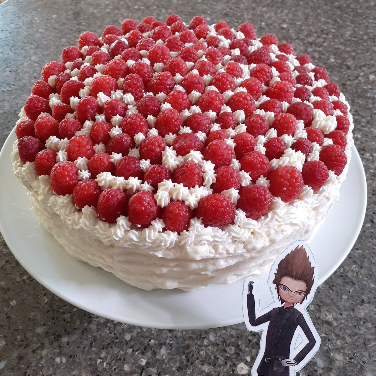 FinalKingdomXV's tweet photo. Gluten free almond cake. Decorated with stabilized whip cream and raspberries. Interior of the cake has cranberries, raisins, sunflower seeds &amp; peanuts. Top layer was actually broken but I magicked it back together. Happy Mother's day! #nofilter #BakingAssistantPocketIgnis https://t.co/r7XtOmK2uO
