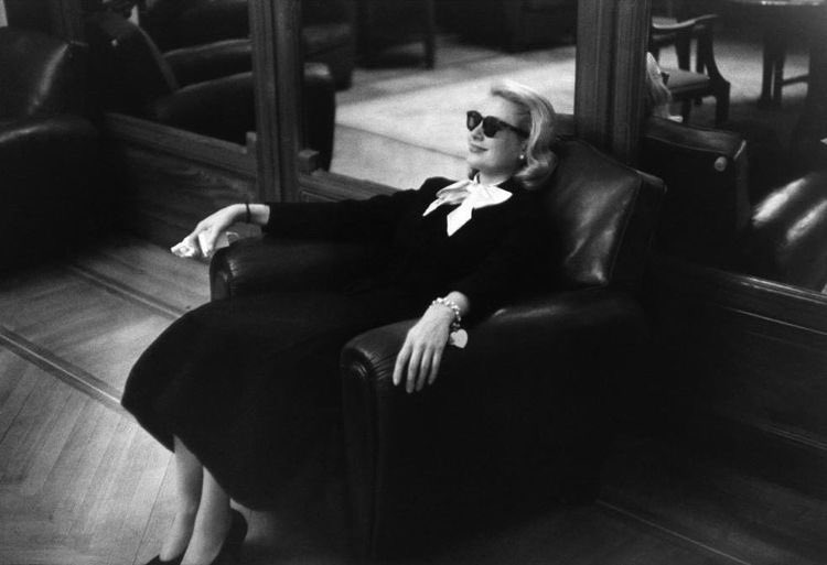 grace kelly at the lobby of the intercontinental carlton cannes hotel, may of 1955
