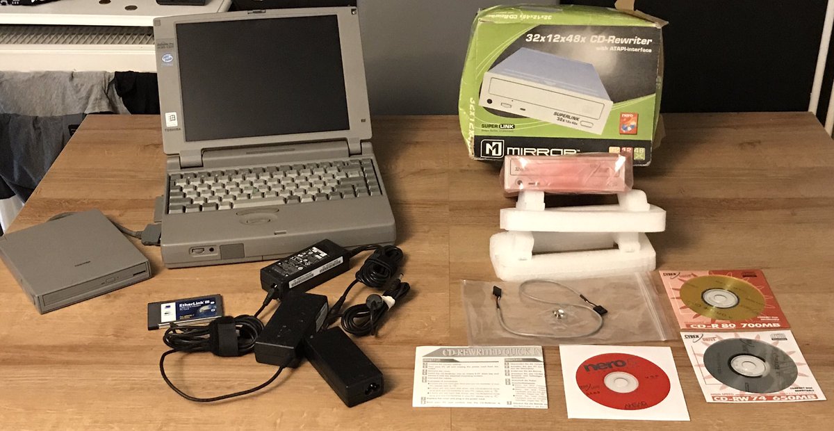 RetroComputingG's tweet photo. This weekends #RetroComputingCarbooting haul consists of a Toshiba Pentium laptop from the 1990s for £8, a few powers adapters for £1 each and an unopened ATAPI/IDE internal optical drive with #Nero5 #NeroBurningROM https://t.co/WkRzfb5w6S