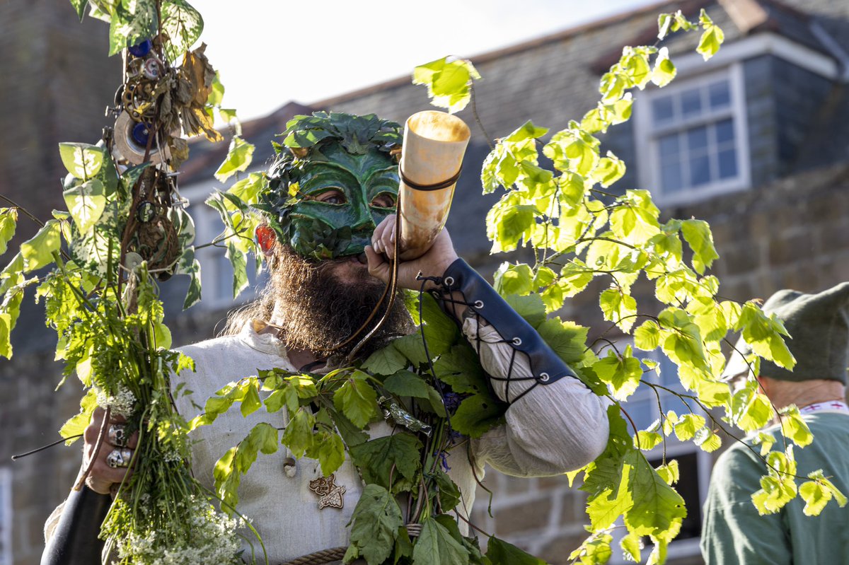 JoryMundy's tweet photo. The Hal-An-Tow during #FloraDay in #helston. A story with many origins  which shows the tales of Helston as a street pageant, St George Vs the Dragon, St Michael Vs the Devil, green men and Robin Hood and St Pirans journey to Cornwall. #halantow #floraday2022 #cornwall #kernow https://t.co/OXvIRmhQg5