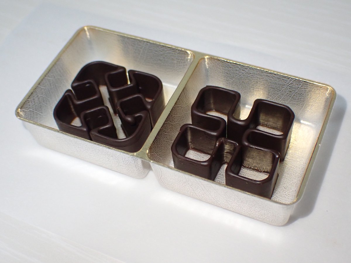 uh_oh_oh_oh's tweet photo. 気になっていた3Dプリンタ製のチョコを買いました。
形状で食感が変わるそうですが、もったいないのでまだ食べてません🍫
#bytebites https://t.co/wkqhkdTkIG