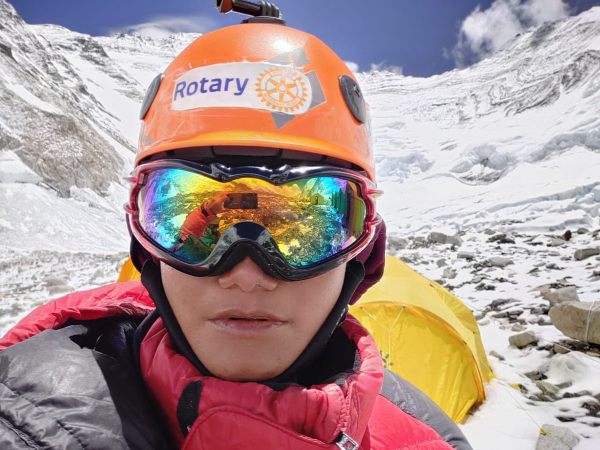 Shekhar_Rotary's tweet photo. A girl on Top of the world is spreading the Rotary’s message of Empowering Girls. Piyali Basak, sponsored by @Rotary India to climb Mt Everest, is a first girl to climb without oxygen. I am so proud to see this girl from my city carrying The Theme Flag &amp; Empowering Girls flag. https://t.co/4LymY0VXWT