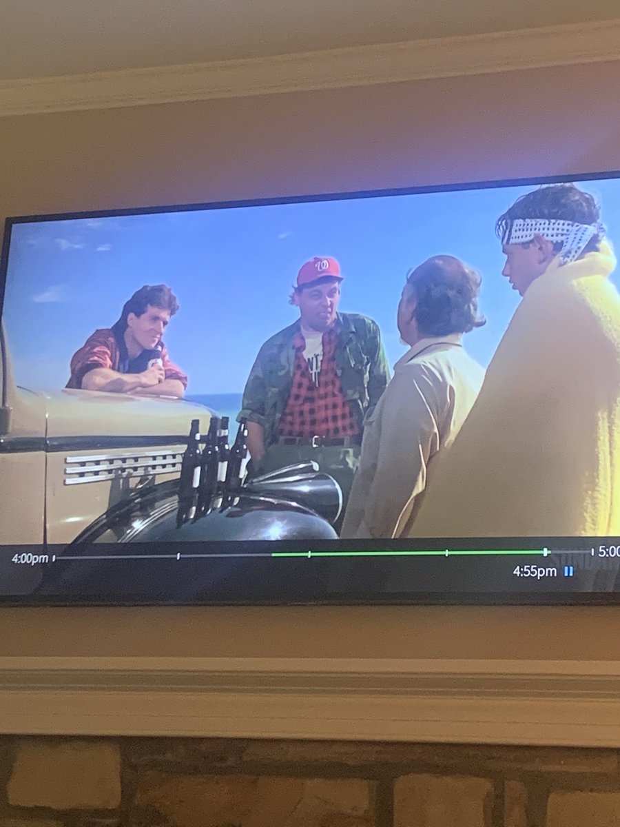 ShannonBream's tweet photo. Ok, Twitterverse - I know someone out there can help solve this mystery. Stumbled upon Karate Kid this afternoon. It was made in 1984, long before the @Nationals existed. So what’s this guy’s hat all about?? https://t.co/1UD1Rgu8so