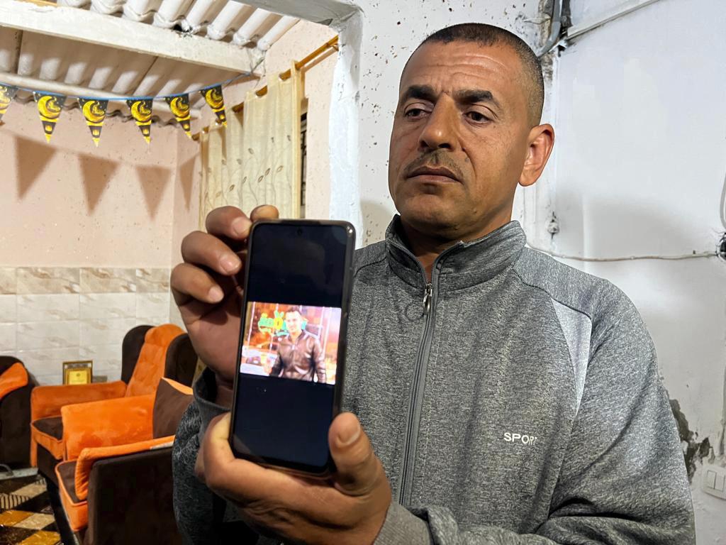 OnlinePalEng's tweet photo. With tears filling their eyes, the family of Palestinian youth Mahmoud Aram in Gaza Strip mourns their son who was murdered by Israeli occupation forces at Jabara military checkpoint near Tulkarm, occupied West Bank. https://t.co/i4M5FTB10y