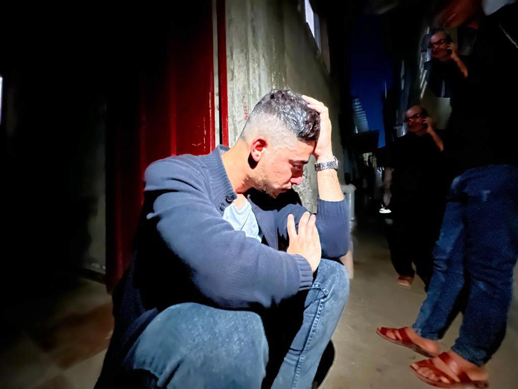 OnlinePalEng's tweet photo. With tears filling their eyes, the family of Palestinian youth Mahmoud Aram in Gaza Strip mourns their son who was murdered by Israeli occupation forces at Jabara military checkpoint near Tulkarm, occupied West Bank. https://t.co/i4M5FTB10y
