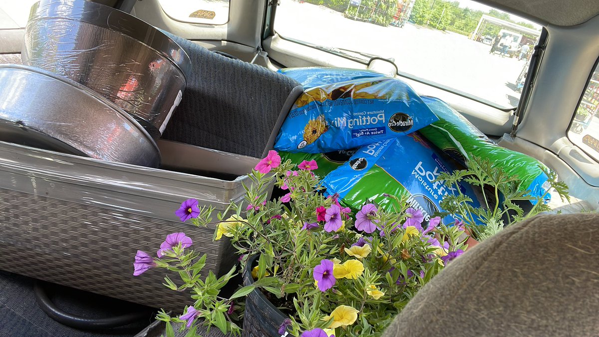 Magskettle's tweet photo. 4 bags of mulch, 4 bags of potting soil, 4 marigolds, 4 petunias, 2 citronella, 1 pepper plant, flowers for the porch, and various pots. You all can keep your pick ups. My outback sport gets the job done. #lesbianlook https://t.co/P0FcObGyQD