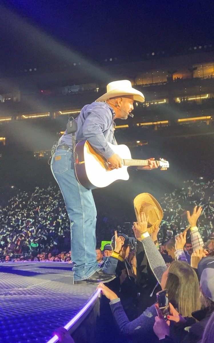 KristaColetti's tweet photo. Somehow, by the actual grace of God, we were  front row center stage to watch @garthbrooks on the field in the center of @NotreDame stadium. Dead. No voice. Unbelievable. I still don’t know if it actually happened… Dream come true. ☘️ 🎶❤️🤩 #GARTHatNOTREDAME https://t.co/QgpPlL8jVB
