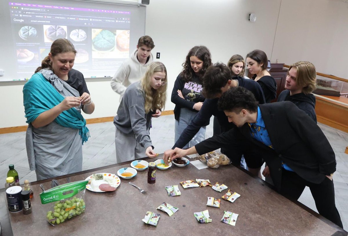 CushingLanguage's tweet photo. Ms. Fralick held a Roman Banquet for Latin 1 last week! There were an assortment of Roman breads, goat cheese, olives, grapes, and garum!! #RomanBanquet #HistoryandCulture #CushingLanguages #CushingLatin https://t.co/PIFqURKq1T