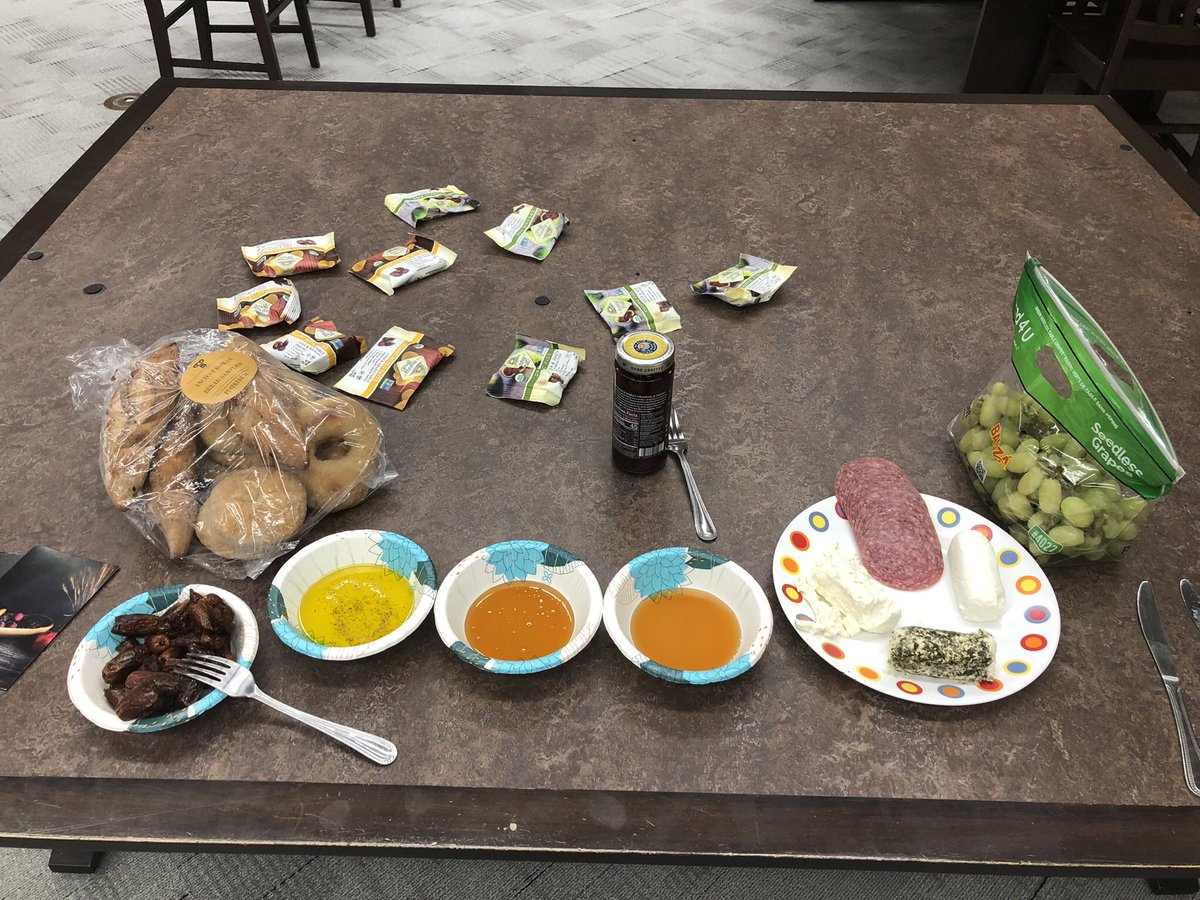 CushingLanguage's tweet photo. Ms. Fralick held a Roman Banquet for Latin 1 last week! There were an assortment of Roman breads, goat cheese, olives, grapes, and garum!! #RomanBanquet #HistoryandCulture #CushingLanguages #CushingLatin https://t.co/PIFqURKq1T