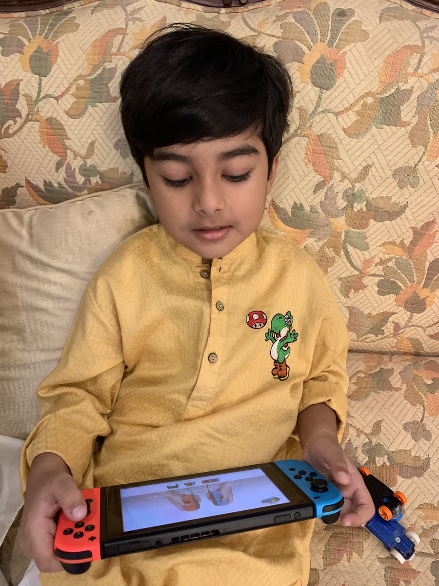 yumnna's tweet photo. A little late for Eid 📸 but my son had a Yoshi 🦖 and 🍄 kurta for Eid.
#NintendoFanBoy
@NintendoAmerica https://t.co/kTMnV0894e