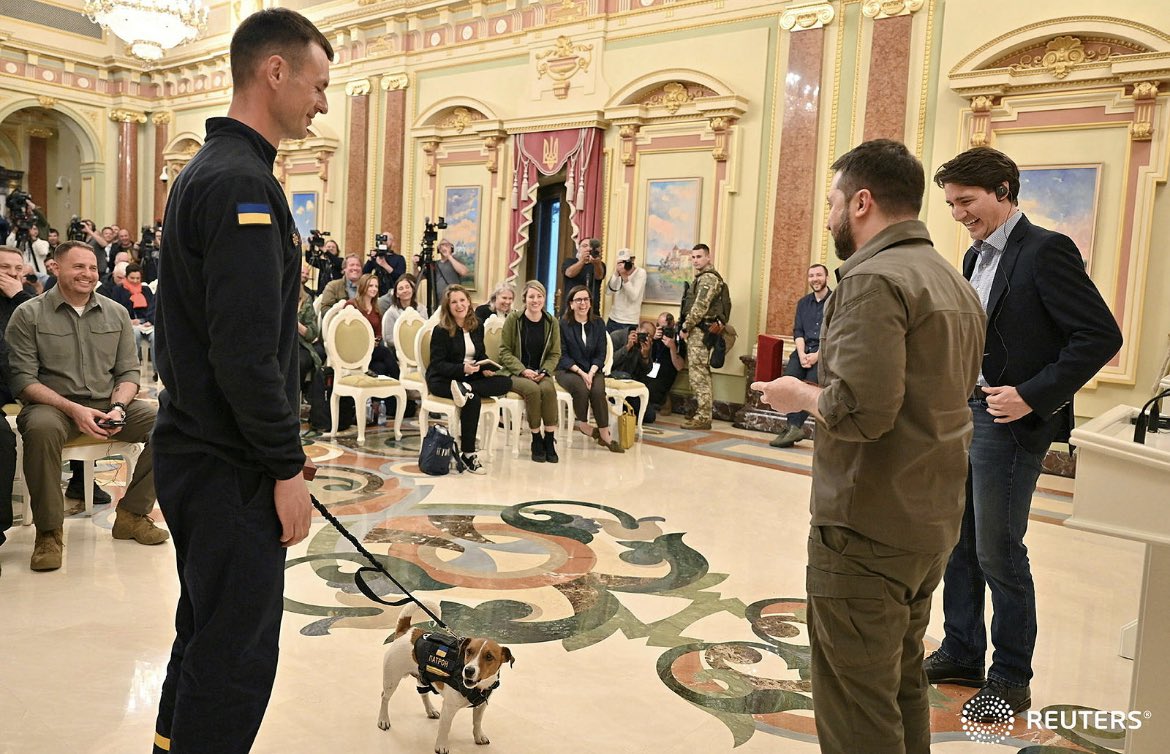 idreesali114's tweet photo. Canadian Prime Minister Justin Trudeau and Ukraine's President Volodymyr Zelenskiy award service dog "Patron" during a news conference, as Russia's attack on Ukraine continues, in Kyiv, Ukraine May 8, 2022.  Ukrainian Presidential Press Service/Handout via REUTERS https://t.co/mfwxF7kyn9