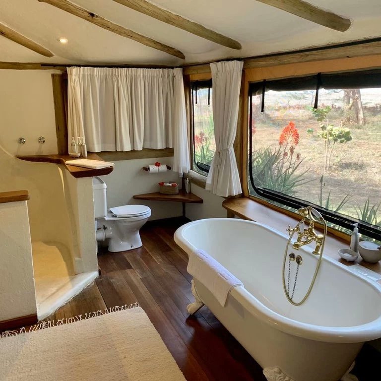 starlucktrv's tweet photo. Sirikoi Lodge is a small and intimate game lodge situated on it's own private estate at the center of Lewa Conservancy. All the rooms are spacious and tastefully designed with a private siting area, big Victorian bath tabs, rain-showers, fireplaces and private deck. https://t.co/Z4xoVSR7Zo