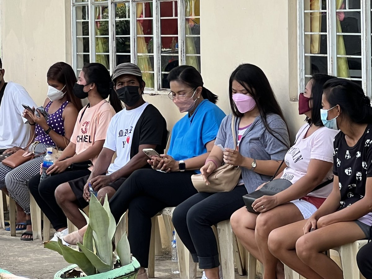 <a href="/maracepeda/">Mara Cepeda</a> Robredo has been waiting for about an hour and a half now here at Carangcang Elementary School. She’s mostly checking on her phone while in queue. She also has a bottle of drinking water with her. Heat is quite intense here. | via <a href="/maracepeda/">Mara Cepeda</a>
