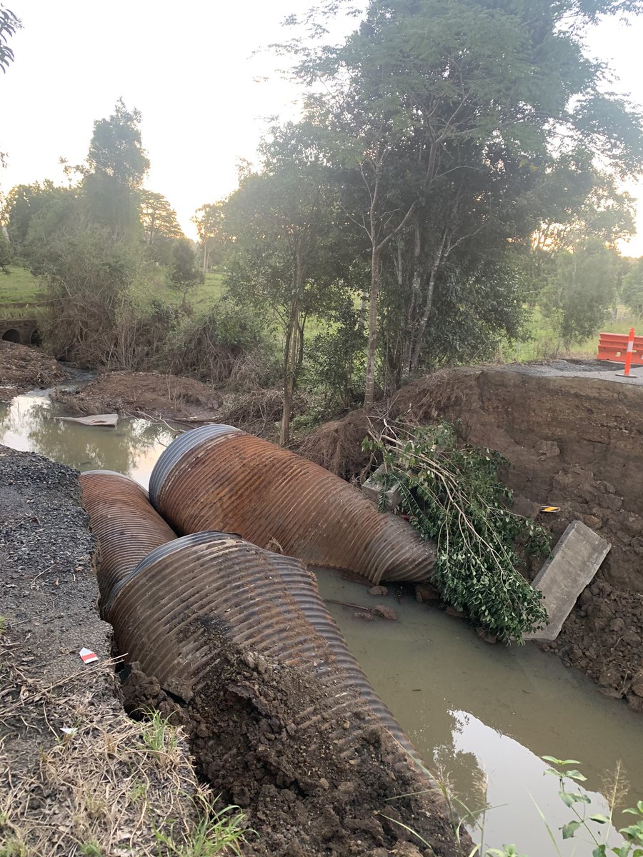 Anthr0pocalypse's tweet photo. Seeing the state of the roads around Lismore really puts into perspective the volume and violence of water that was coursing its way into town on the night of the historic flood.

Keerong Road was already bad but now it’s impassable. 

The cost of climate inaction is stacking up. https://t.co/8VUNIukbUJ