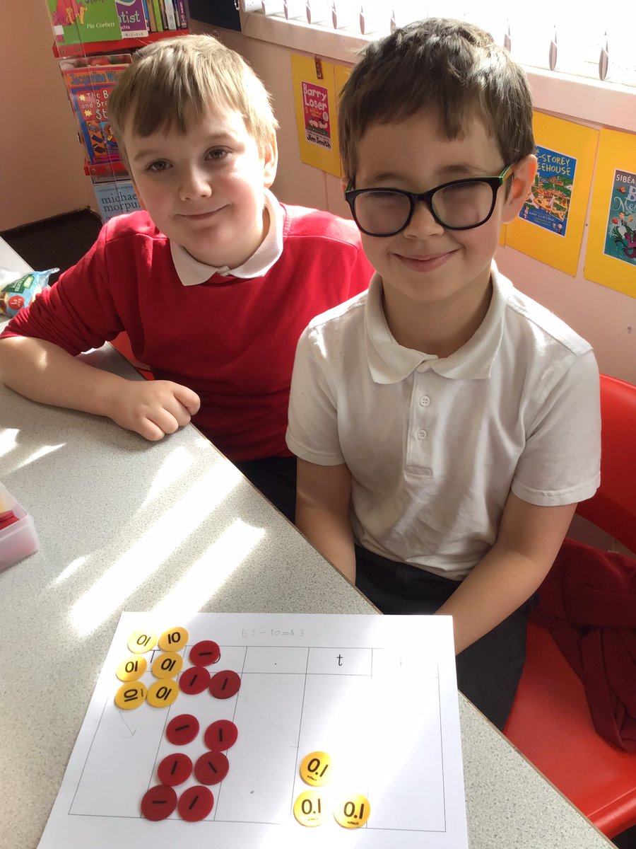 OakfieldY4's tweet photo. Dividing two digit numbers by 10 this morning #oakfieldmaths https://t.co/Xzb7Nvon8l