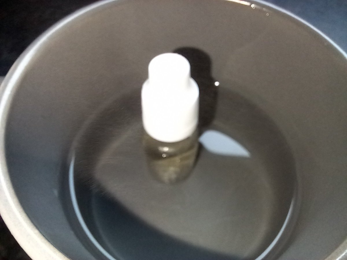 Vaping40watts's tweet photo. Helping along some mixed fruit eliquid 10 mins in warm water then a good shake... had already boiled the kettle for a cuppa so saves running the hot tap.. #vaping #vaper #ukvaper #vaperuk #vapeon #diyeliquid https://t.co/SYxSqeVbIT