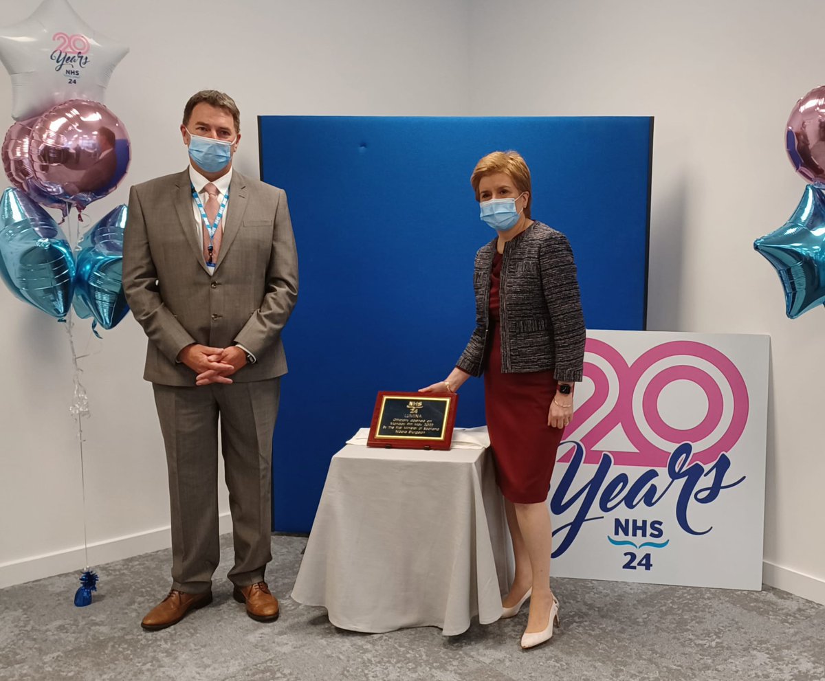 ScotGovFM's tweet photo. On the 20th anniversary of @NHS24, First Minister @NicolaSturgeon praised staff for their commitment and tireless effort to ensure the public have access to the right information and support as she officially opened a new centre for the service in Hillington this morning. https://t.co/gckcpjCaMe