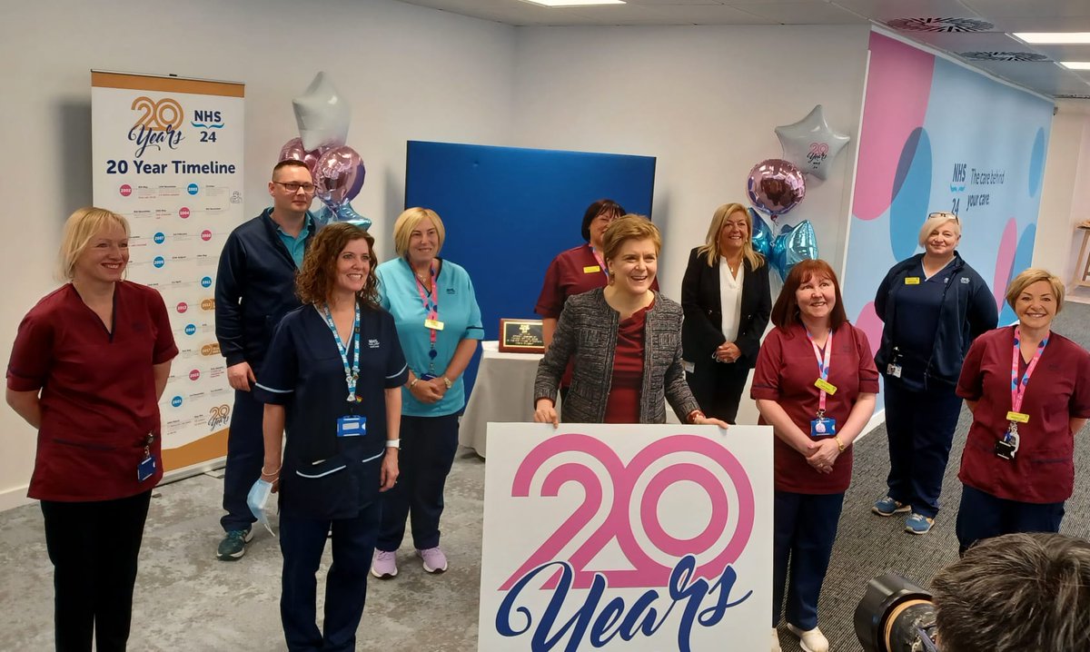 ScotGovFM's tweet photo. On the 20th anniversary of @NHS24, First Minister @NicolaSturgeon praised staff for their commitment and tireless effort to ensure the public have access to the right information and support as she officially opened a new centre for the service in Hillington this morning. https://t.co/gckcpjCaMe