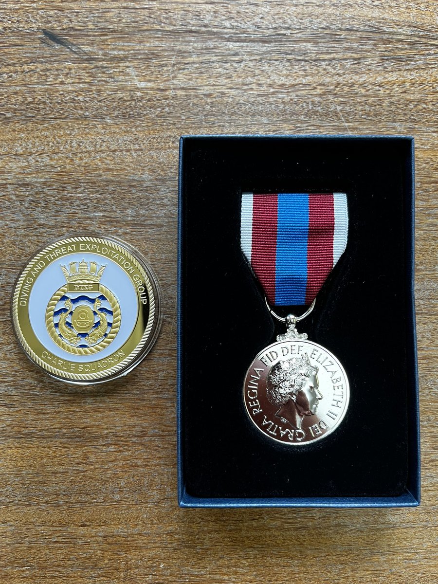RN_DTXG's tweet image. CO Charlie Squadron presents the team with their well earned Queen’s Platinum Jubilee medals in recognition of their service during this important milestone in the Sovereign’s reign. @RoyalNavy @RAdmJudeTerry #divenavy #bombfrog 💣🐸