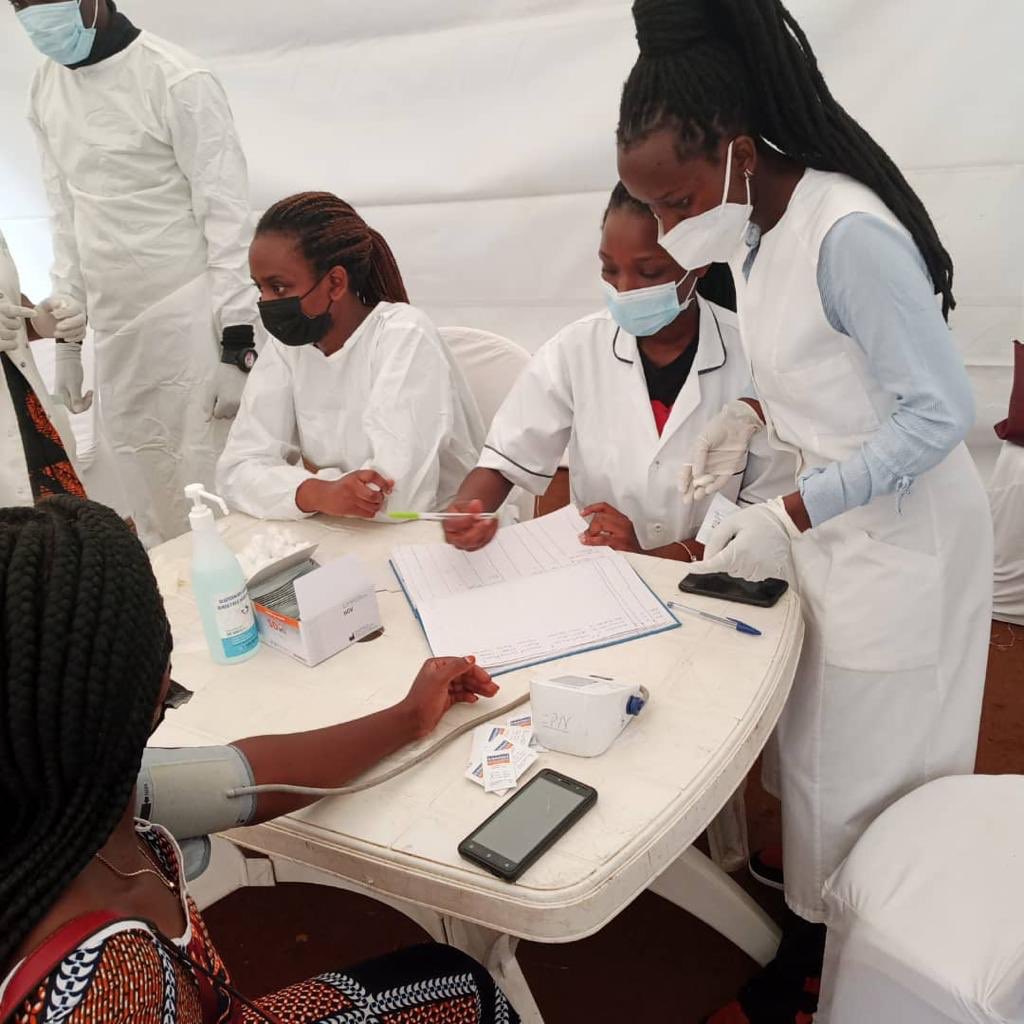 RNMU1's tweet photo. The nursing and midwifery week in Rwanda is well spent. Giving back to society by taking care of the public’s health. RNMU &amp; @NMSAR2017 are currently carrying out a screening of NCDS at @kabuga market @norsksykepleier @ICNurses @gitembas2020 @btntvrwanda @rbarwanda https://t.co/52pg0ElBGP