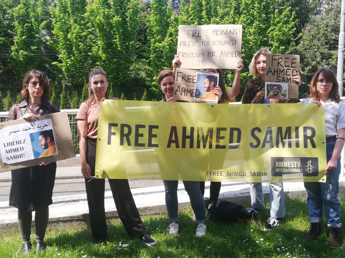 FreeAhmedSamir1's tweet photo. Today is #AhmedSamirSantawy's retrial. Together with @AmnestyAustria, we came together at the Egyptian Embassy in #Vienna to call for the only acceptable verdict: Ahmed's unconditional and immediate release. We want justice now! Ahmed must be free! https://t.co/PMc3Ps78CE