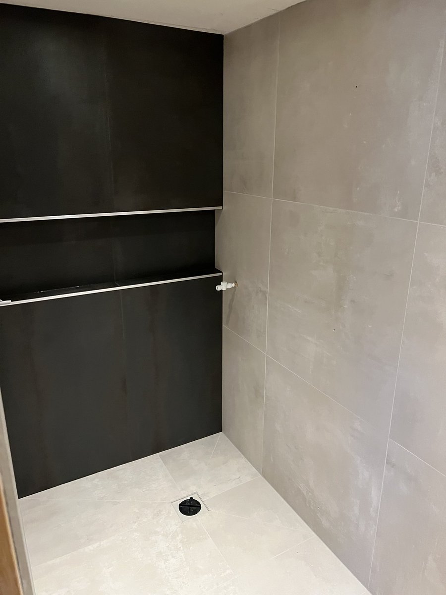 Grouted, siliconed, all holes for sanitary and fixtures drilled , I’m outta here.  <a href="/tilemasteradhes/">Tilemaster Adhesives</a> <a href="/KerakollUK/">Kerakoll UK</a> @ctctiles 👍🏼