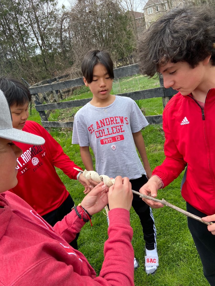 standrews1899's tweet photo. Grade 8 students worked on their wooden spoons, planted trees, and cooked bannock over the fire in OEE 🥄🌲🍞 #OutdoorEducation #boysofSAC https://t.co/MOB0IVqO4r