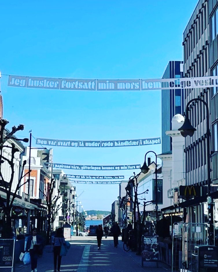 1/4
Today I couldn’t be happier, as a poem of mine is now flying over the main street in the city of Kristiansand, Norway (Markens gate) in the context of the “flying poem installation”, organized by artist Arne Vilhelm for the past six years.