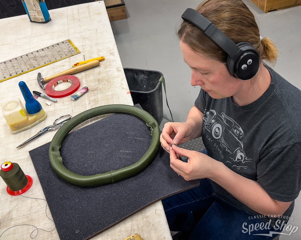 ClassicCarStdio's tweet photo. Laura knocks out
another killer looking steering wheel! This
is a @sparc.industries "Truss" wheel
wrapped in @hydesleather Vision Bosco
leather. #classiccarstudio #sparcindustries
#hydesleather #hogring https://t.co/J4OaUJgR4c