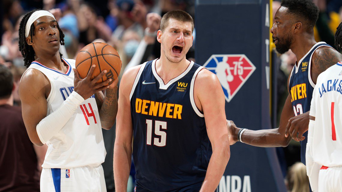 KyleClark's tweet photo. Nikola Jokic named 2022 World’s Strongest Man after carrying 14 men (2,963 lbs/1,343 kg) a distance of 82 games. https://t.co/Z2wrxpGe4O