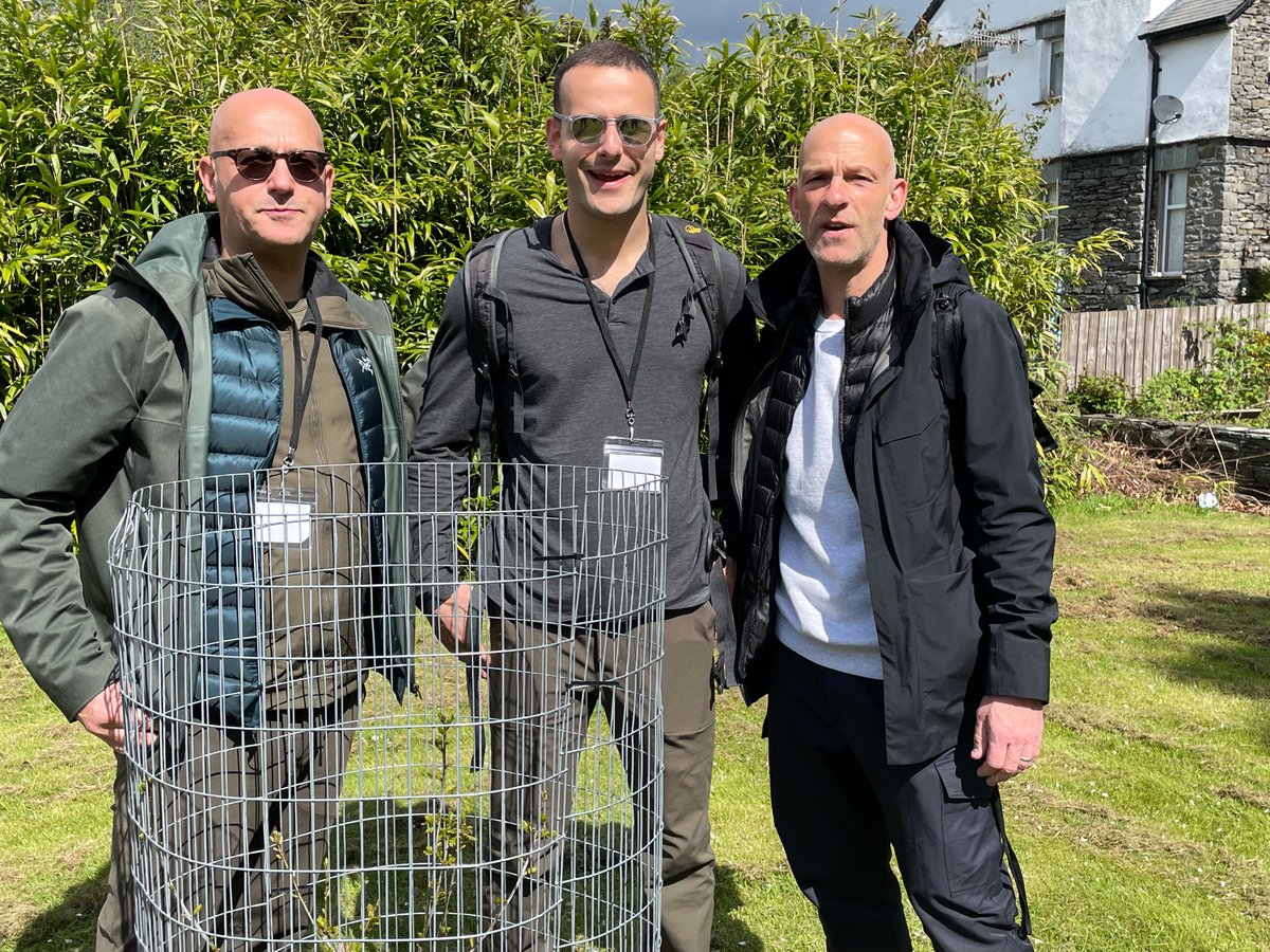 Maurice, Sam and Nathan Helfgott standing by the tree their father and grandfather Sir Ben Helfgott planted in August 14 2015, in the grounds of the former Calgarth estate.