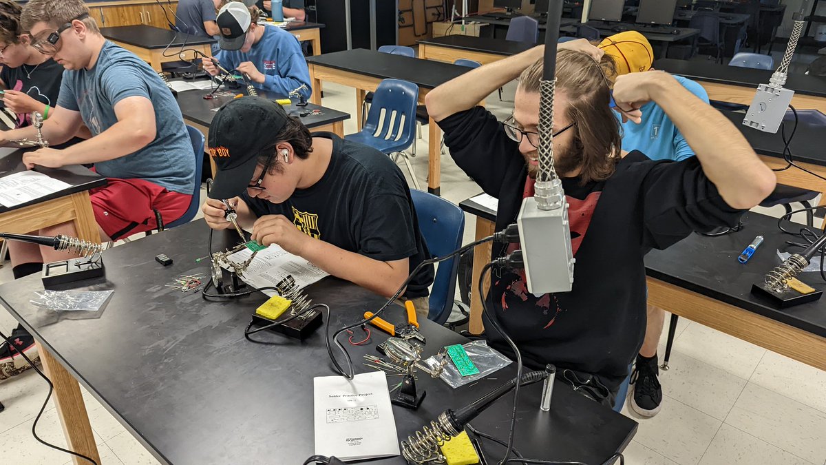 nhs_dotson's tweet photo. Ms. Holstein's Engineering class is hands-on with circuit boards today. Tricking rocks to think is harder than it looks! #nhsLionPride #pltw https://t.co/THEI8CEFi7
