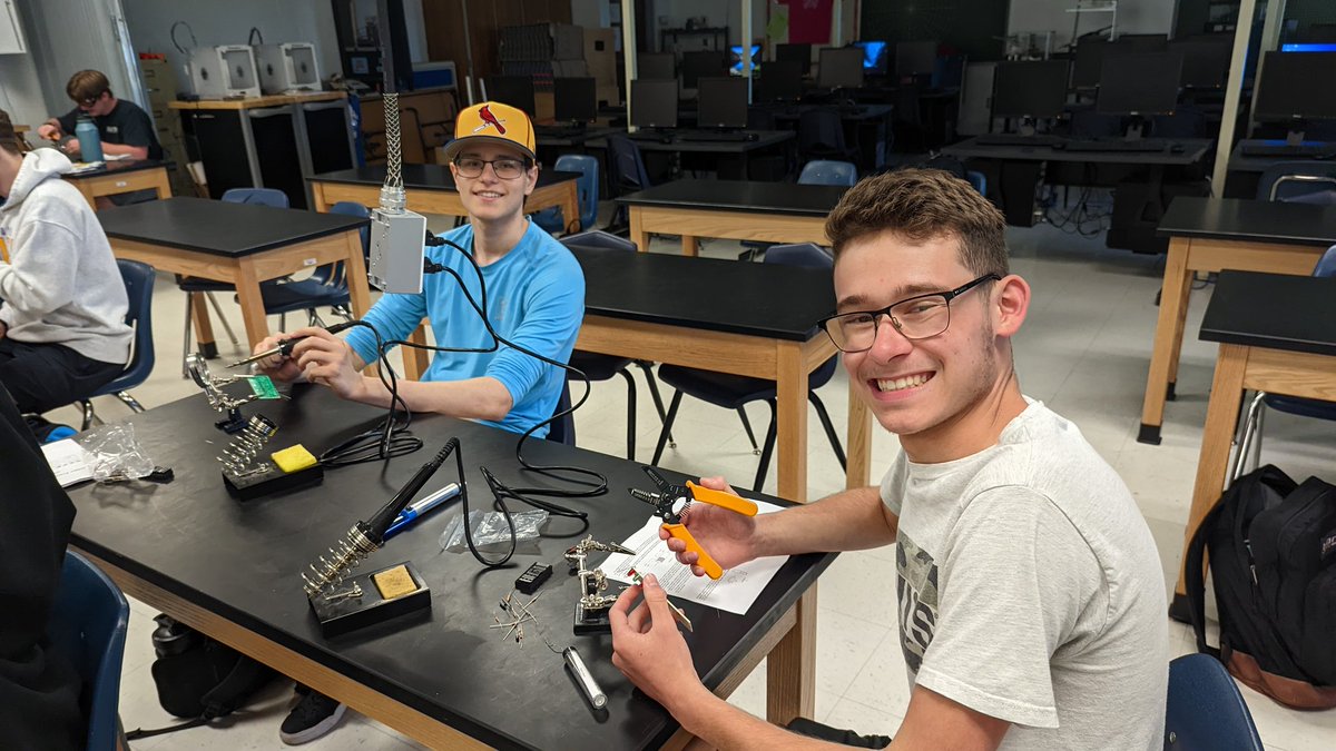 nhs_dotson's tweet photo. Ms. Holstein's Engineering class is hands-on with circuit boards today. Tricking rocks to think is harder than it looks! #nhsLionPride #pltw https://t.co/THEI8CEFi7