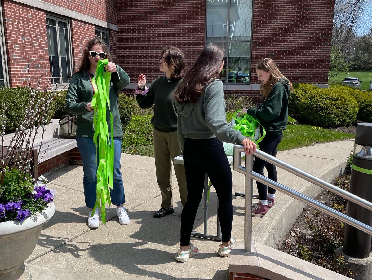 Woodlands1858's tweet photo. It’s Mental Health Awareness Month! Today, in collaboration with Paws for Patrick, our community tied green ribbons around campus to show our support. #wearesacredheart #mentalhealthawareness 💚 https://t.co/SdFylZewR3