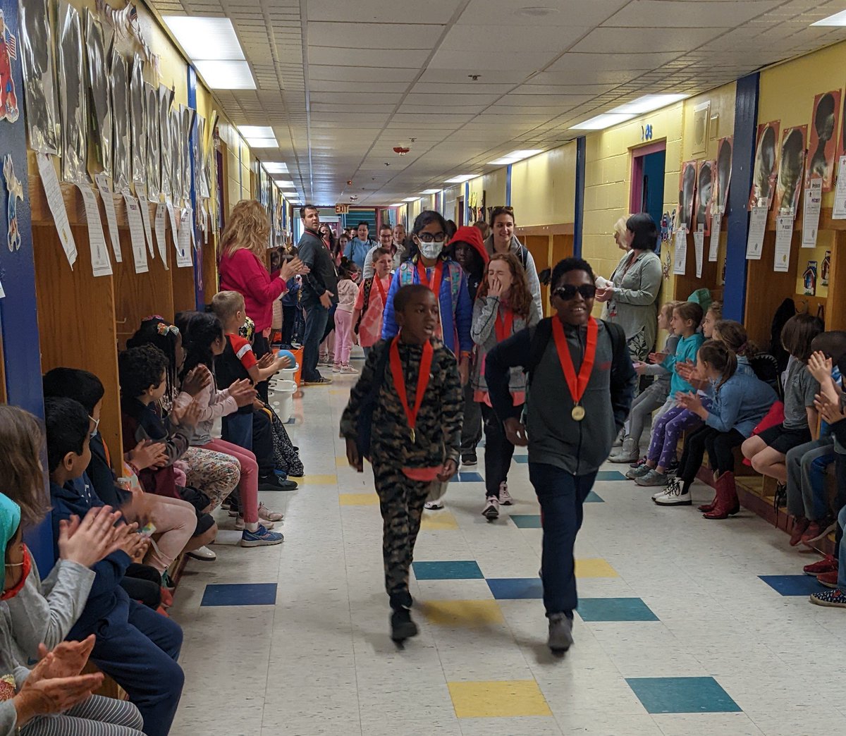 RebeccaFarnham2's tweet photo. First grade was happy to pause our reading of the book I Like Myself in order to cheer on our FW Special Olympics athletes as they returned from the games in Wilmington! Great job, everyone!! Way to represent! https://t.co/0D1uG1SW5H