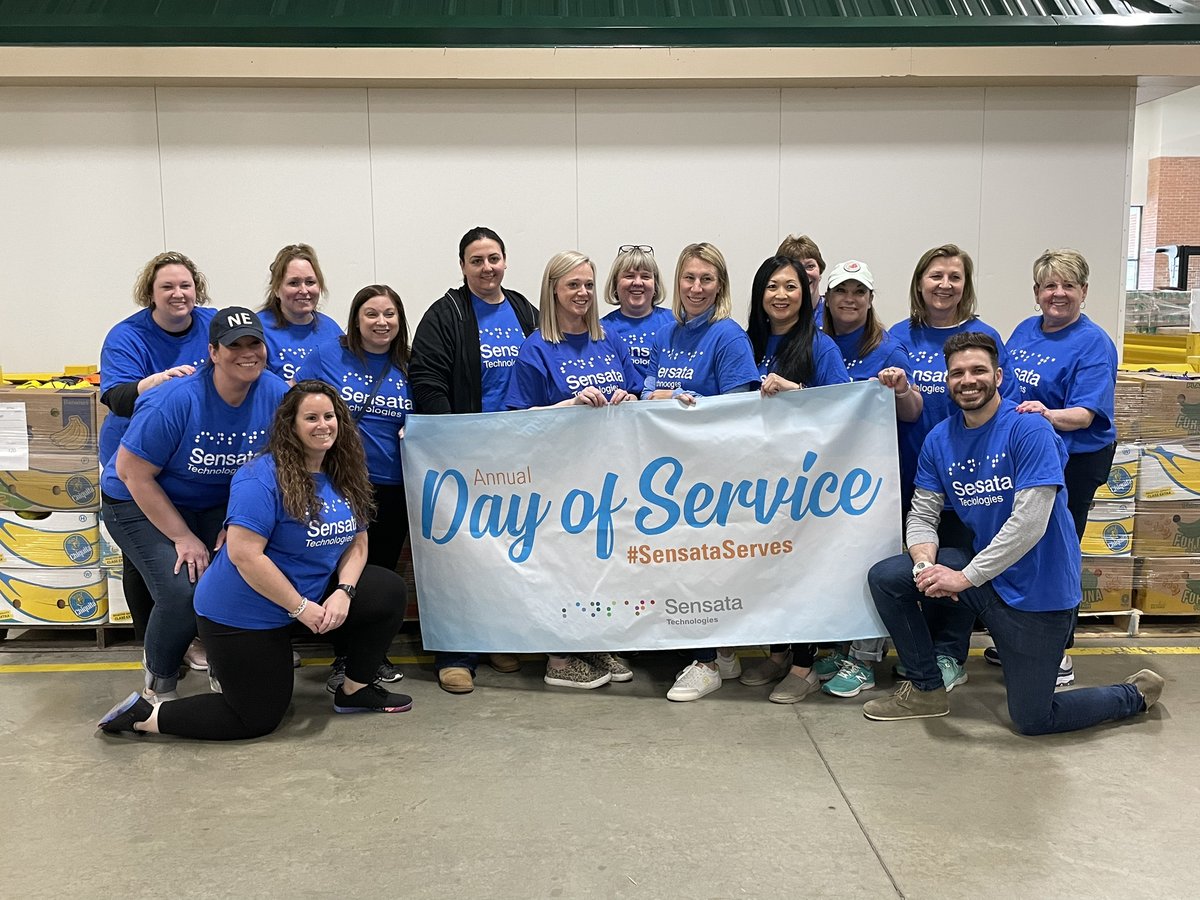 Sensata's tweet photo. At the @RIFoodBank Sensata volunteers, including Lynne Caljouw, SVP, Chief Human Resources Officer, are packing Meals4Kids boxes which provide one week’s worth of non-perishable food for school-aged children. #SensataServes #STDOS2022 https://t.co/QYASjQAz15