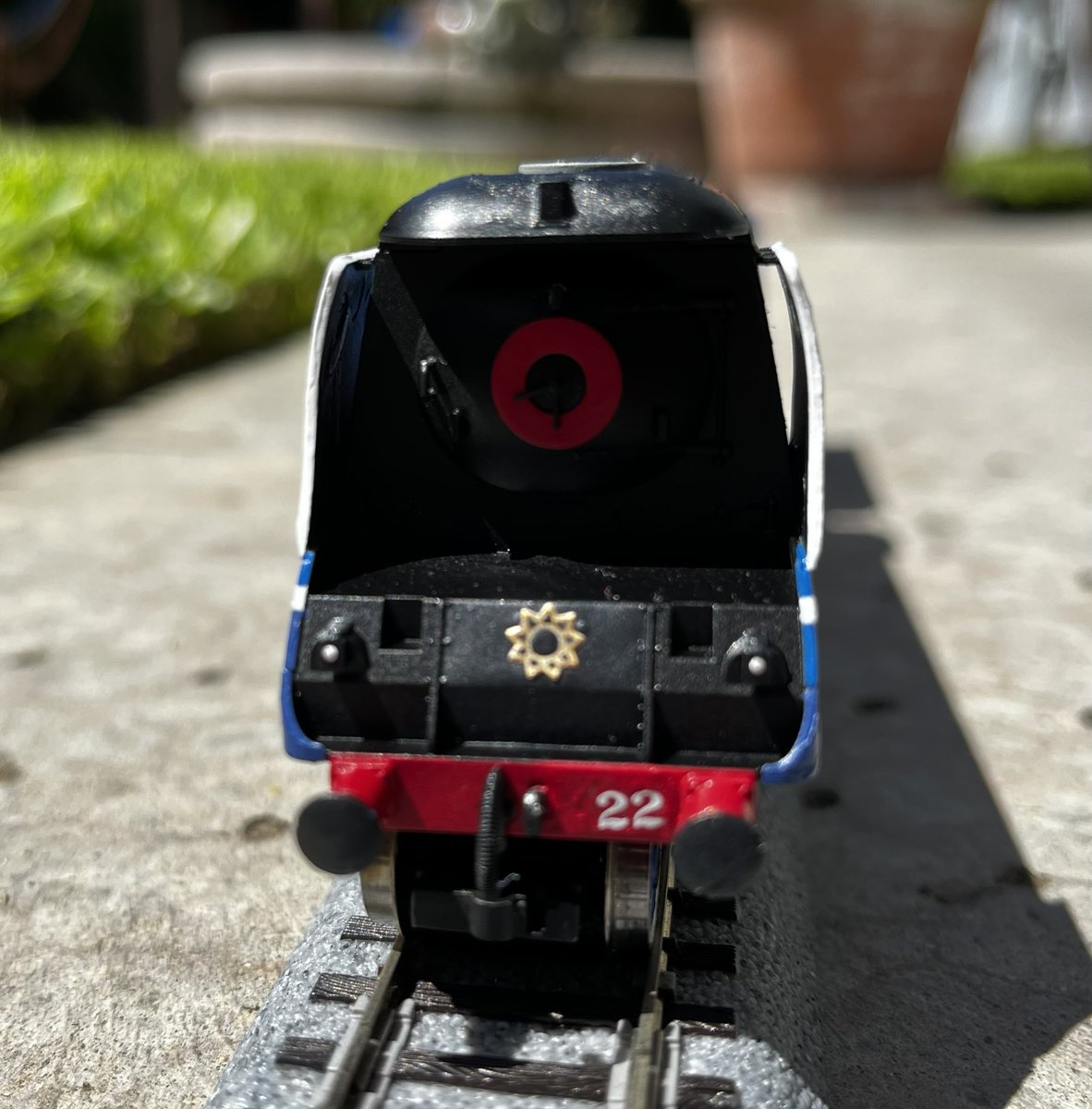 magicrailwayst's tweet photo. to make a long hiatus short, this is my interpretation of rebecca ! she’s basically the same but blue and different little logos on her hehe. probably the most fun i’ve had painting a model train in a while. i also used water decals for the first time which was sick. https://t.co/Svf2vYtPl4