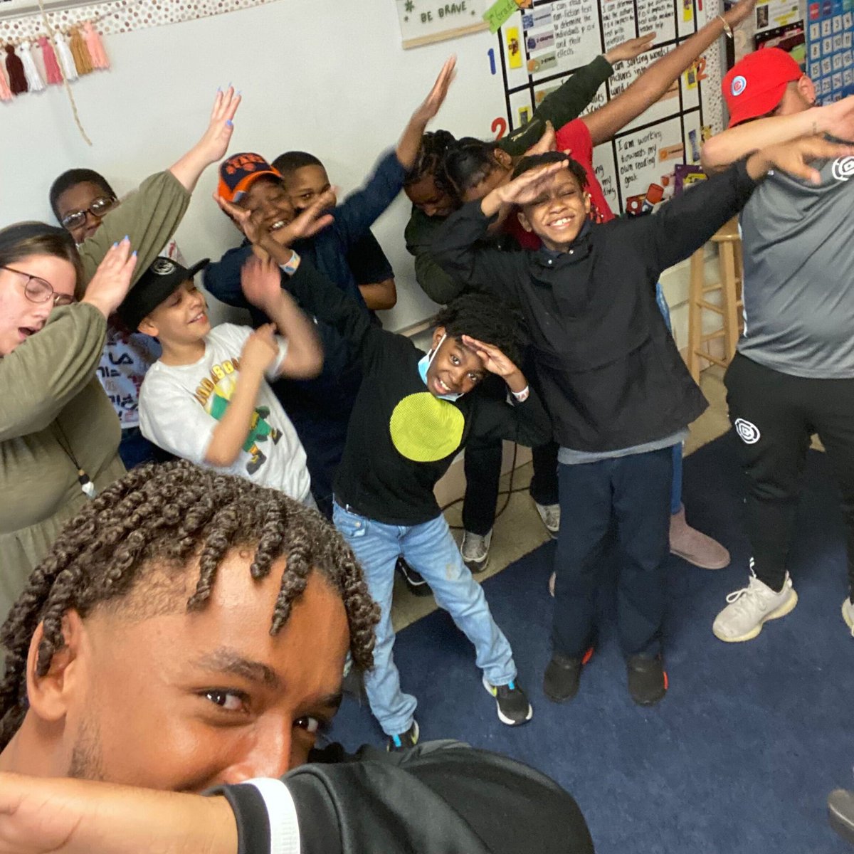 ChicagoFire's tweet photo. Andre is the 🐐 and you can't tell me otherwise. 

Thank you to the Gresham School of Excellence for having @_andre36 out last week to visit the P.L.A.Y.S. kiddos for practice. 🔥 https://t.co/eyspMEd9Cj