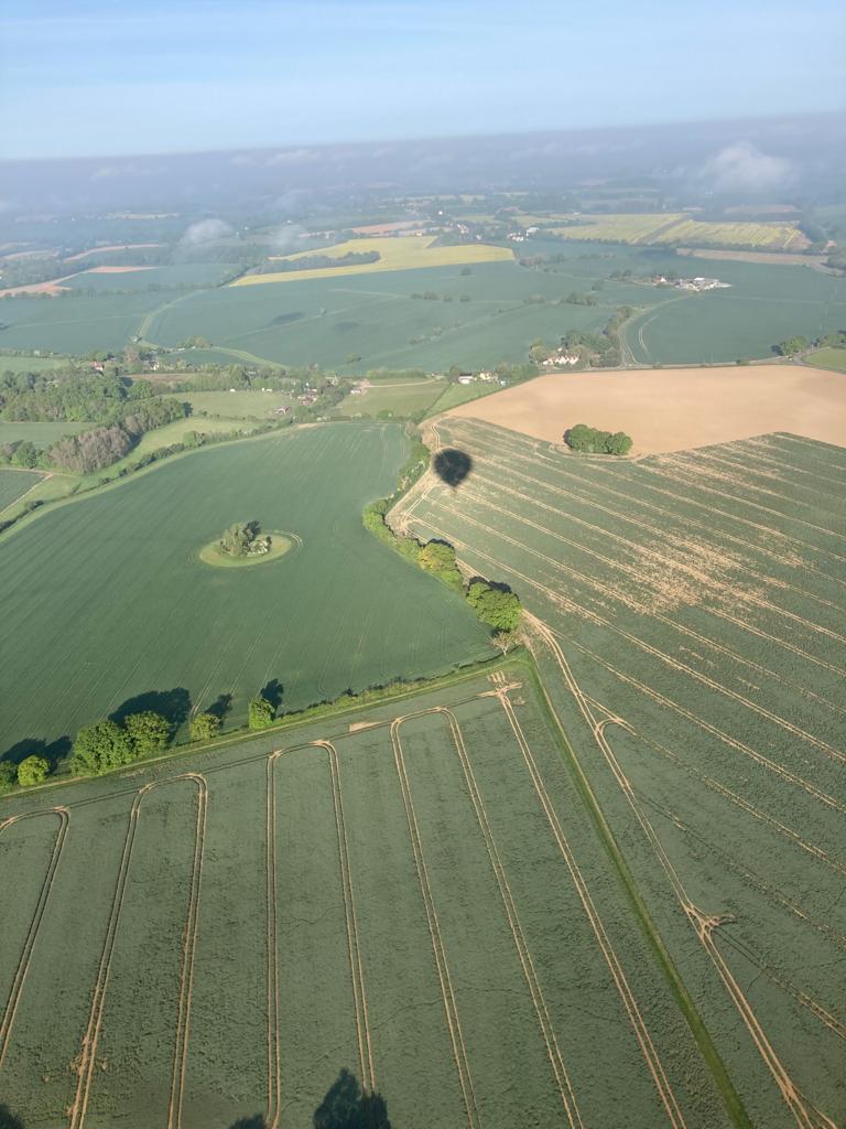 Lord_Meltdown's tweet photo. Great day ballooning #TakeLifeHigher with @VirginExp flying from #Feering Essex to #Bulmer Suffolk. (See our balloon shadow below) Local villagers bemused by airborne appearance into farmers field &amp; prosecco toast finale. https://t.co/pXjI9RE8I0