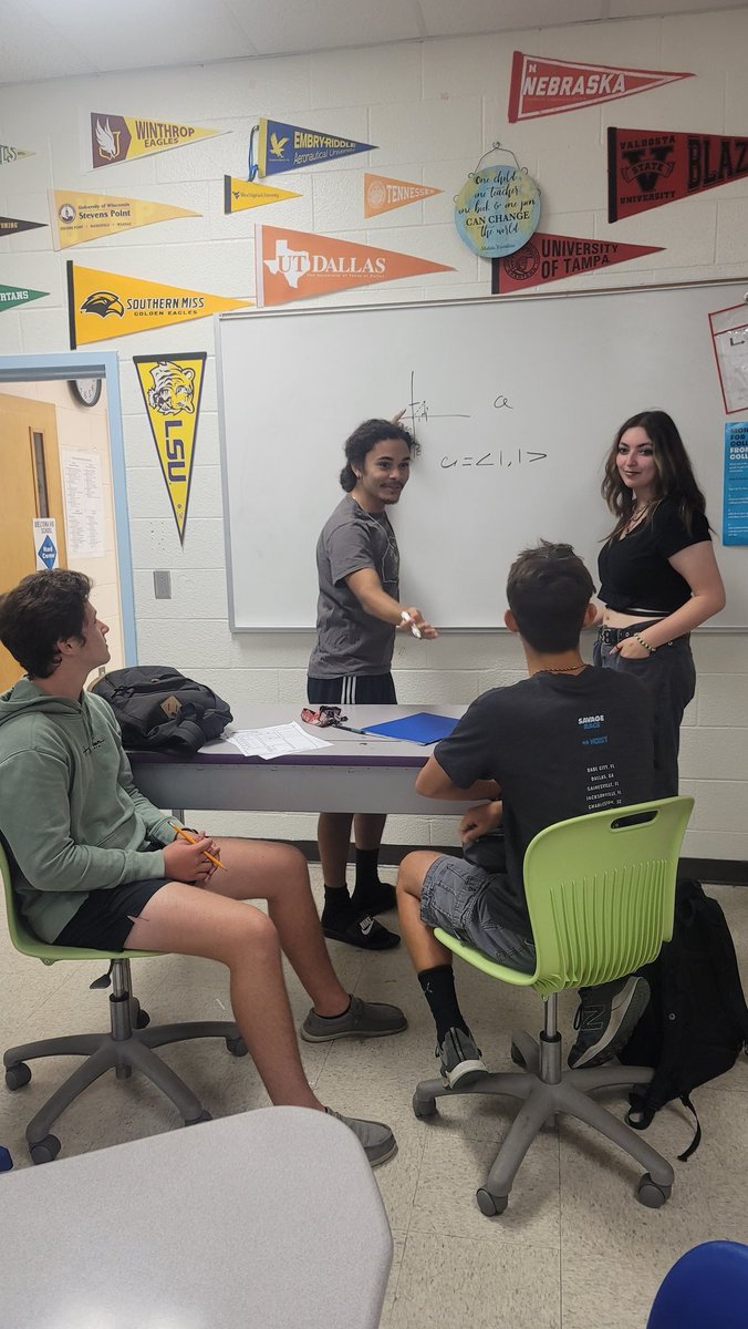 MrsDAversaAVID's tweet photo. Some kiddos teaching/learning/studying for math during lunch today. 💪🤍🐺💙 #ilovemyjob @DHSHappenings https://t.co/ZZU7GQPtep
