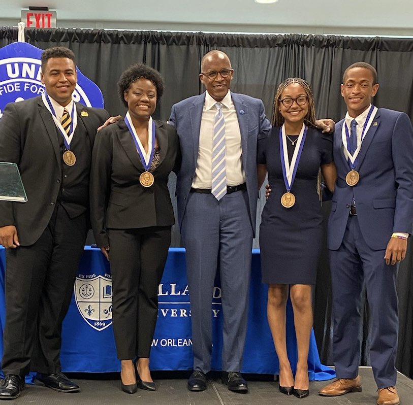 DrRobertCollins's tweet photo. Congratulations to Dillard Urban Studies and Public Policy Senior @amayaalisee (in blue dress) on winning the Sutton Best All Around Student Award. Here with President @HipHopPrez and the other Sutton Award winners. She has been admitted to Harvard Law School. https://t.co/2sTW9w6xPQ
