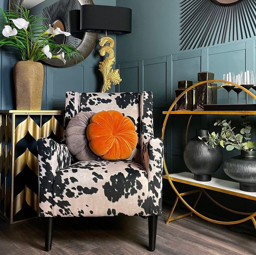Our orange fleur cushion and cow print chair has certainly outshone the sun!🌞 Giving spectacular spring vibes! ✨ 

-
-

#springdecorating #besthomedecor #goldandglam  #homedecoration #inspiration #stylishfurniture #glaminteriors #cowprint