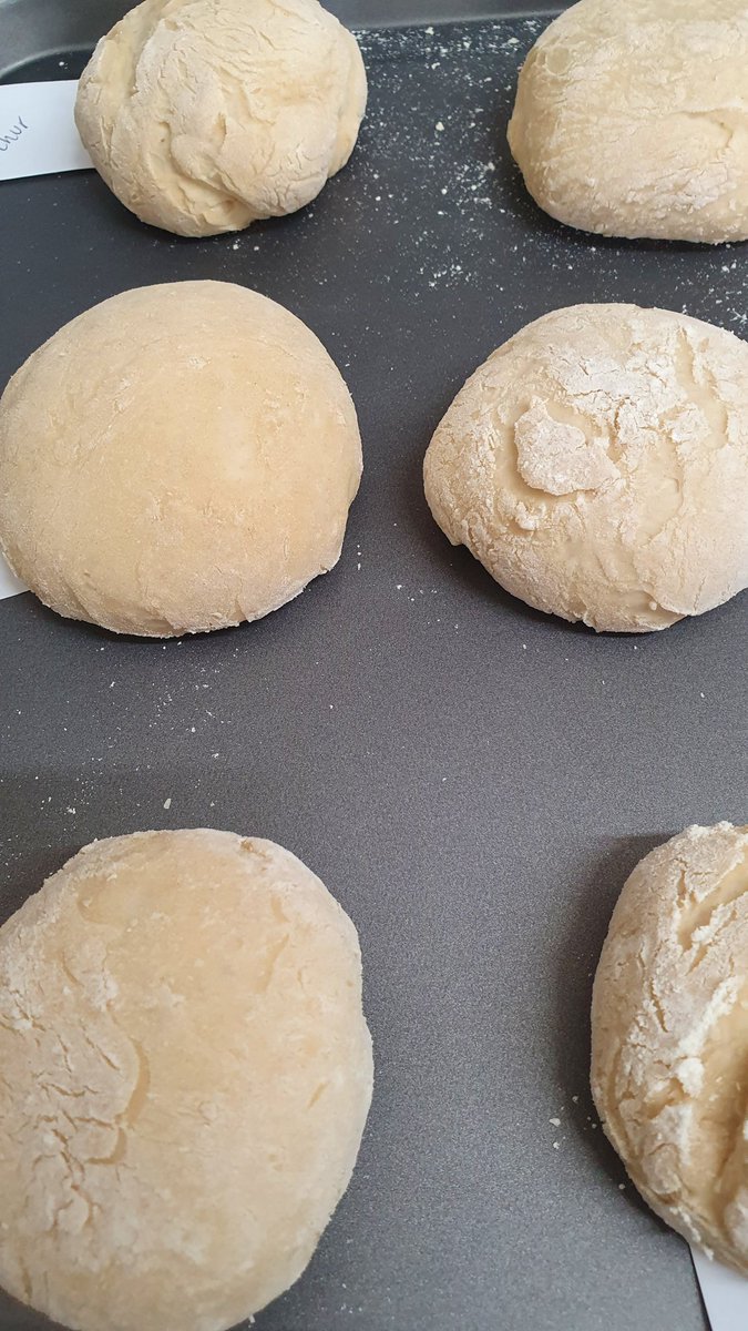 BroughEagles's tweet photo. The children made their own bread today, using their fingers to knead the dough & their hands to manipulate the dough into balls.... here they are proving or proofing (both are fine) #causeandeffect #changesovertime #yummy https://t.co/U4NgpE8vAf