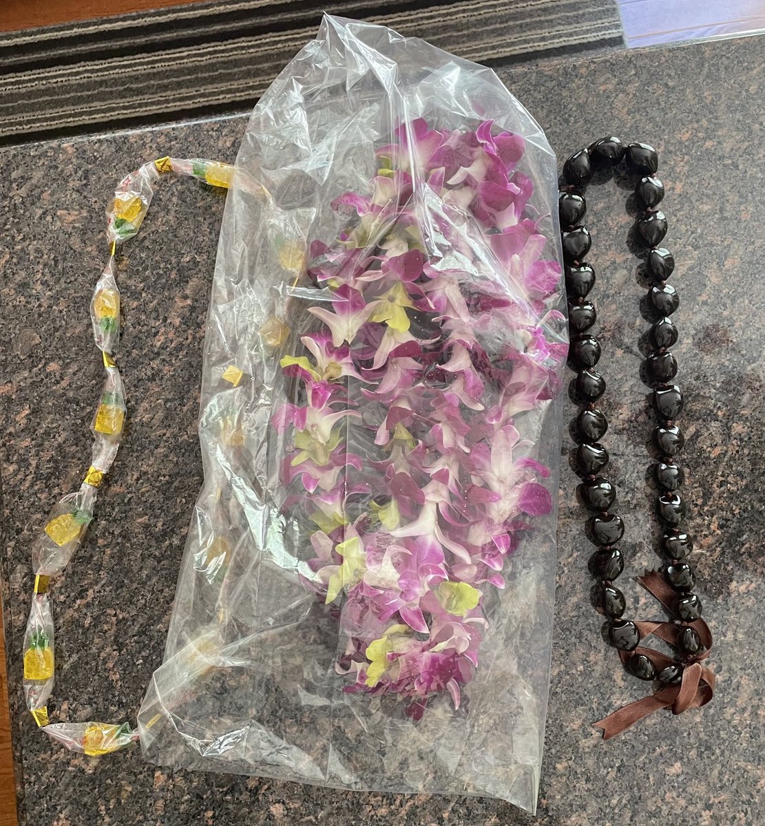 NOW it feels like graduation…Hawaiian Style! I love you family! 🤙🤟#hawaiianleis #graduation
