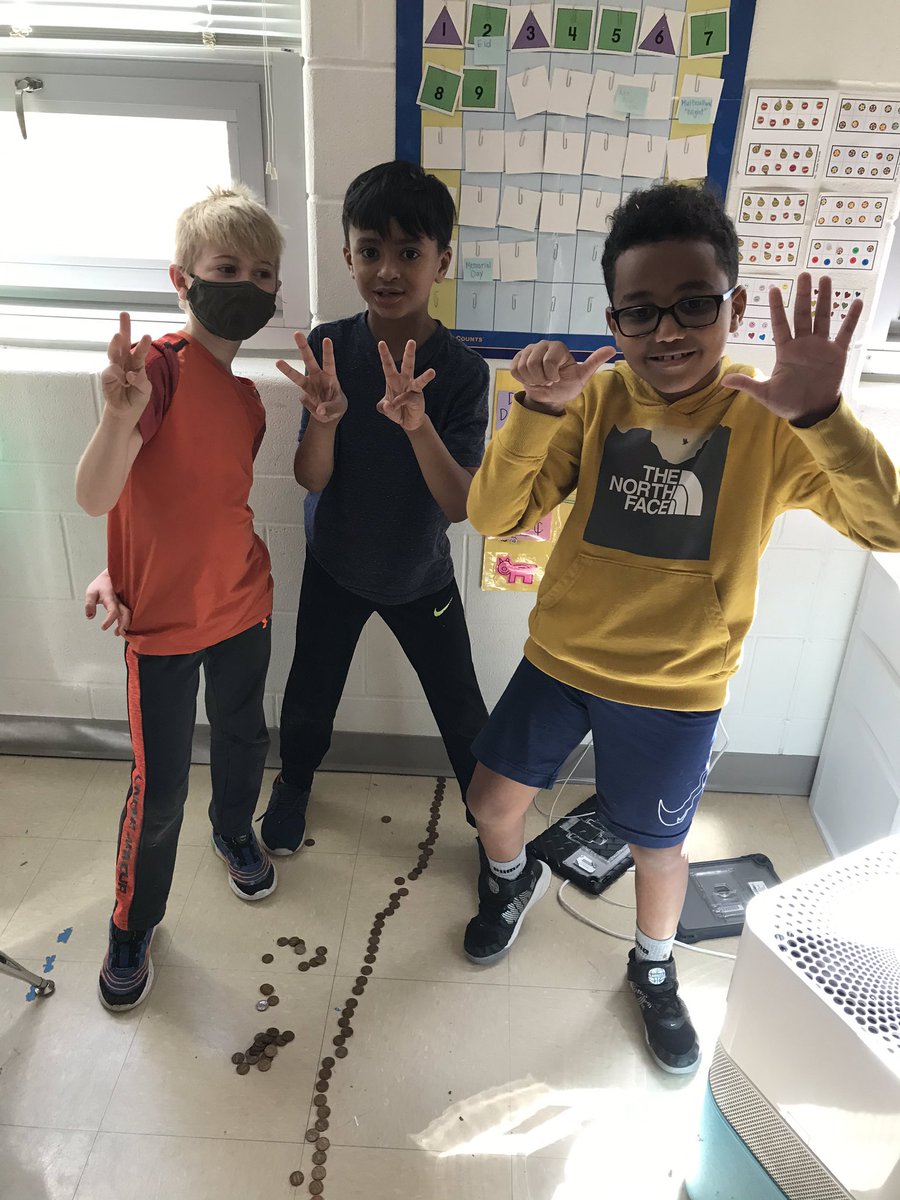 Check out this teamwork: these friends measured the classroom width in pennies! It was 366 pennies from our rug to the wall! <a href="/APS_ATS/">Arlington Traditional School (ATS)</a> <a href="/APSMath/">APS Math Office</a>