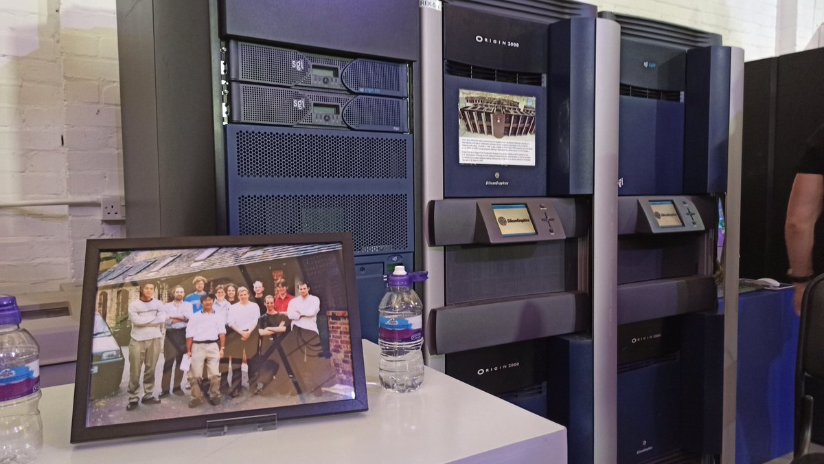 Original developer team picture at the talk - behind, some SiliconGraphics machines.