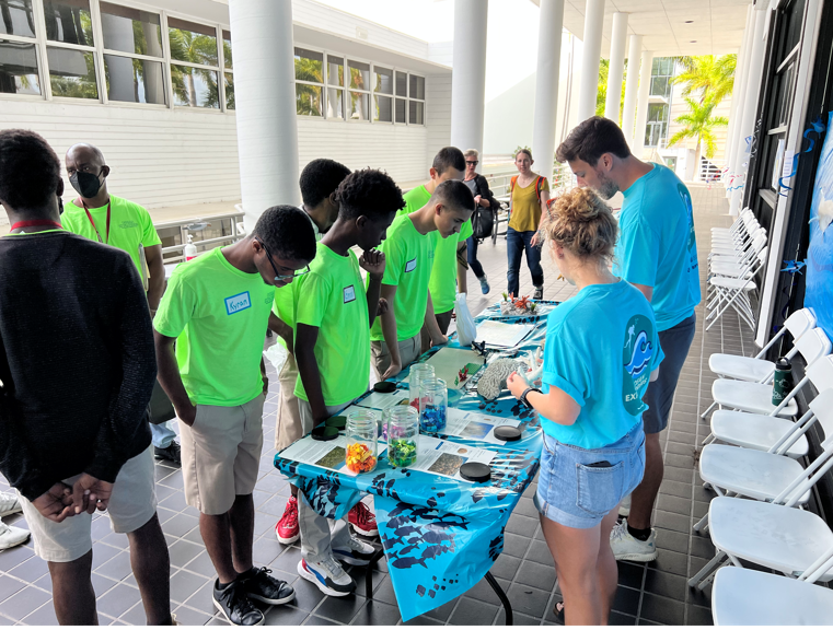 marinesanctuary's tweet photo. #OceanExplorersMiami was an immersive field trip at @UMiamiRSMAS that provided experiential learning for 100 students from underserved schools. Students "got their hands wet" at 14 stations featuring topics like #CoralReef restoration, #OceanAcidification, and underwater robots! https://t.co/OQU7o2spt5