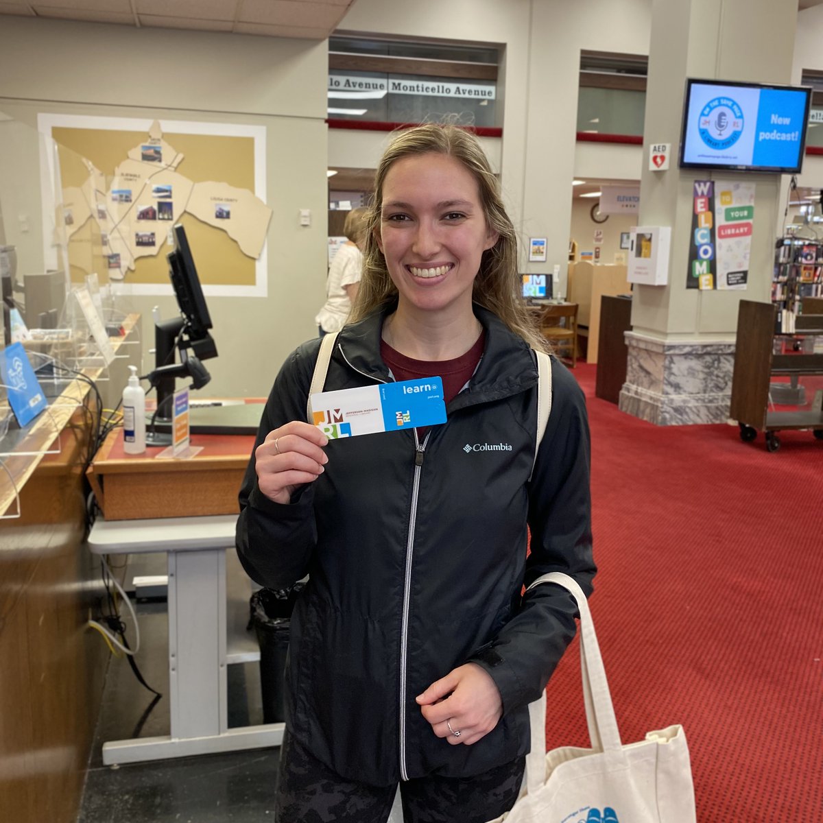 J_MRL's tweet photo. Saturday's Searchapalooza scavenger hunt benefitting SARA brought many folks following clues in to Central Library. For this new Charlottesville resident, it was also the perfect opportunity to get a JMRL library card. Welcome, Kaitlyn! #jmrl #jmrlib #librarycard #librarylove https://t.co/vj0X3G1luU