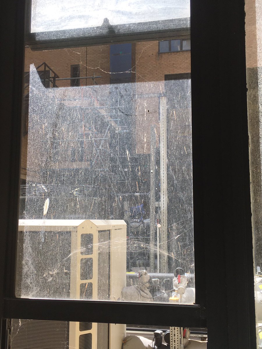 TimCJBoswell's tweet photo. My view at work today. Been waiting 2 years now for the windows to be cleaned following installation of this lovely ventilation plant https://t.co/NoiWrByK7D