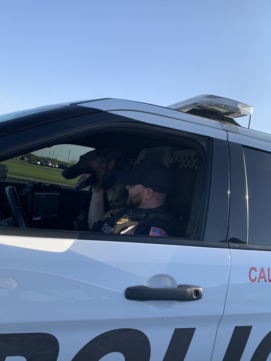 K-9 Serg enjoyed the beautiful weather this morning while watching school traffic. K-9 Serg loves seeing the smiling children which explains why his favorite places are parks and schools. Pictured with K-9 Serg is his human partner and chauffeur Officer Speakman